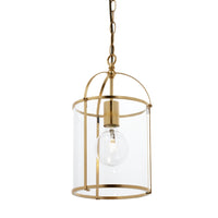 Gold pendant light with clear glass shade on a white background