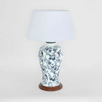 Decorative table lamp with floral pattern on a white background