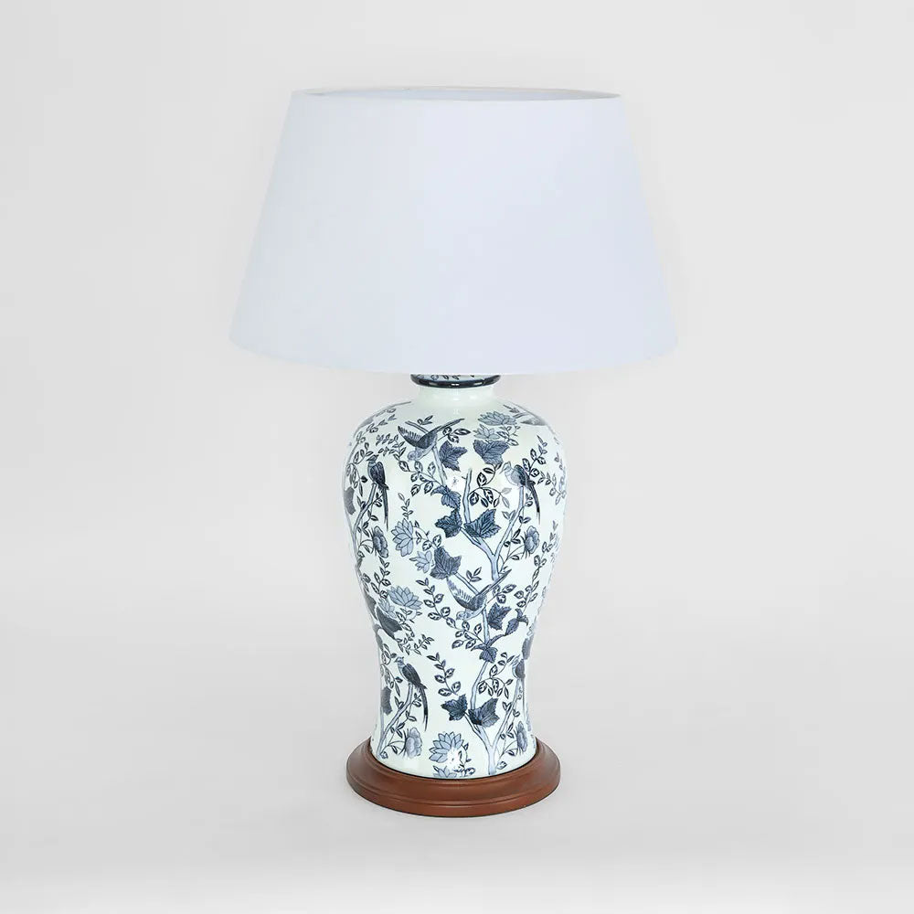 Decorative table lamp with floral pattern on a white background