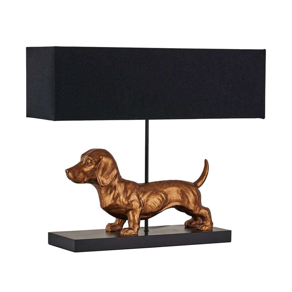 Dog-shaped table lamp with a black rectangular shade on a white background