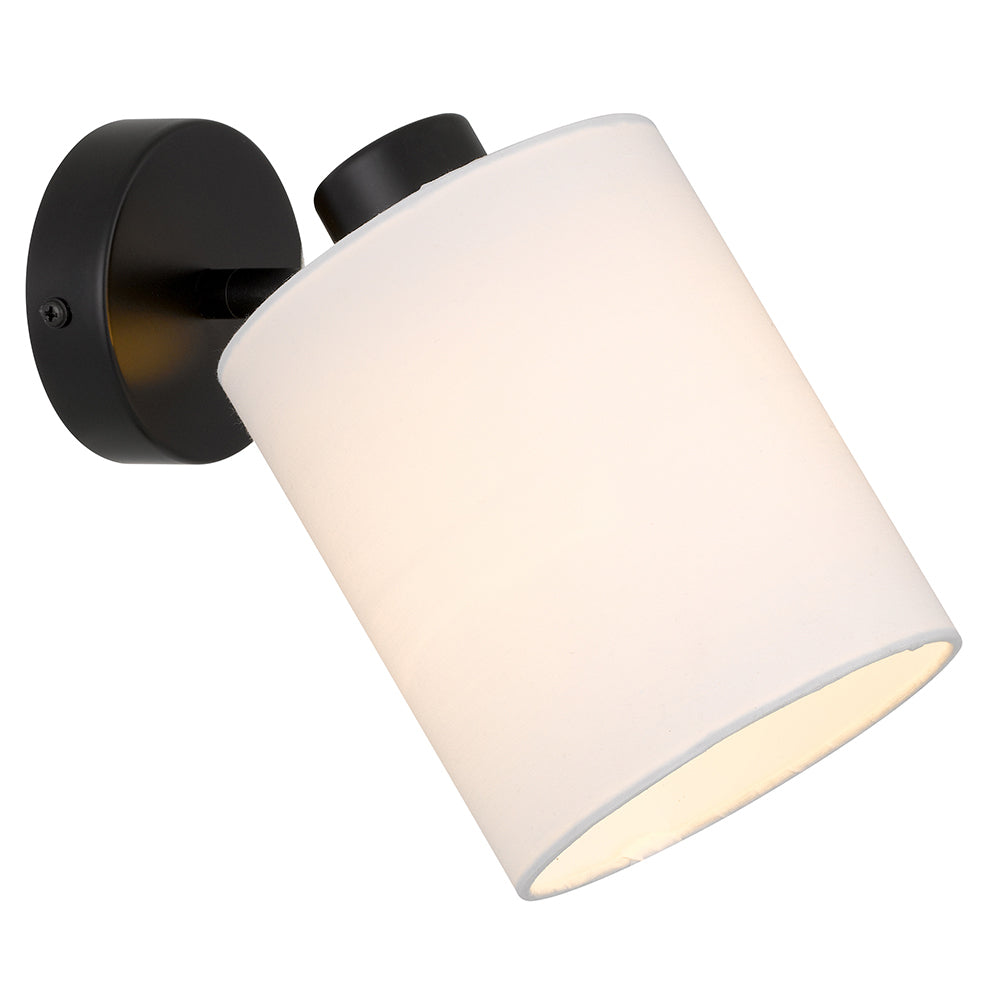 Wall-mounted light fixture with a white shade and black metal fixture on a white background