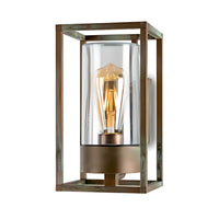 Decorative wall light fixture with clear glass and bronze metal frame on a white background
