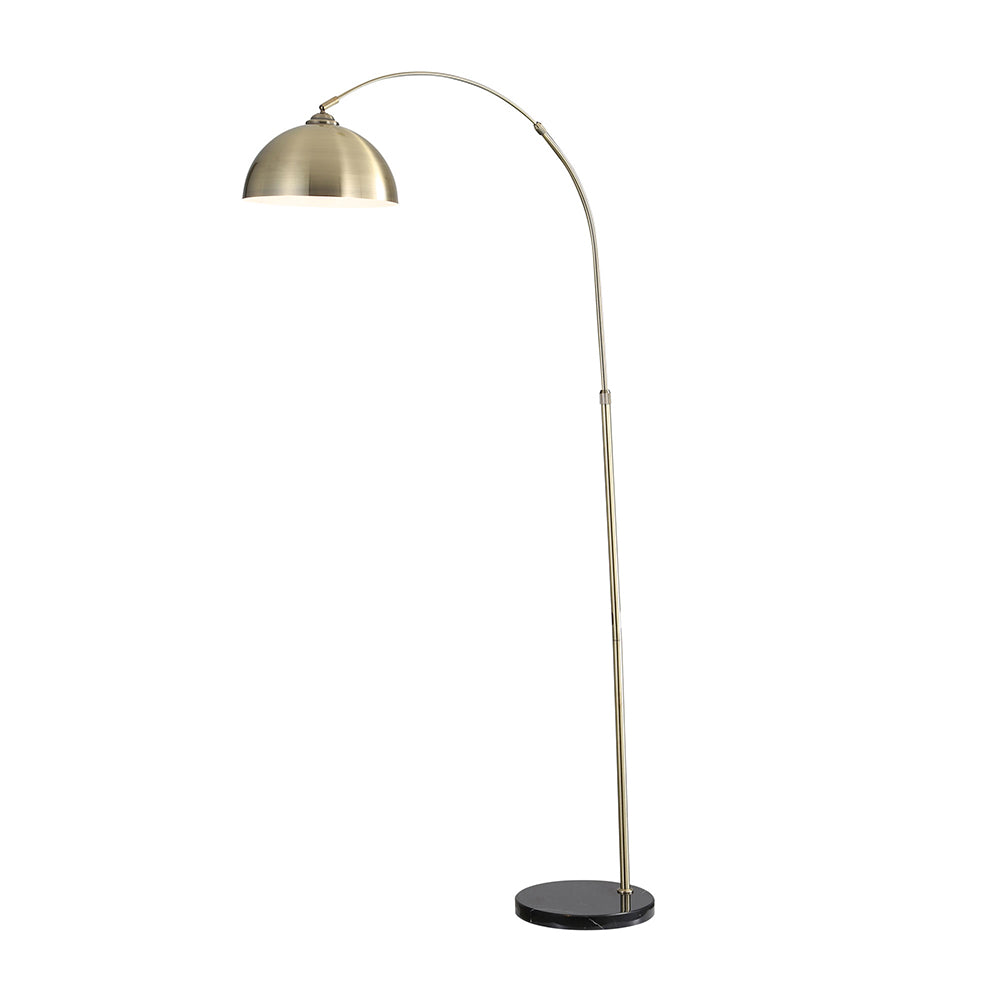 Gold arch floor lamp on a white background